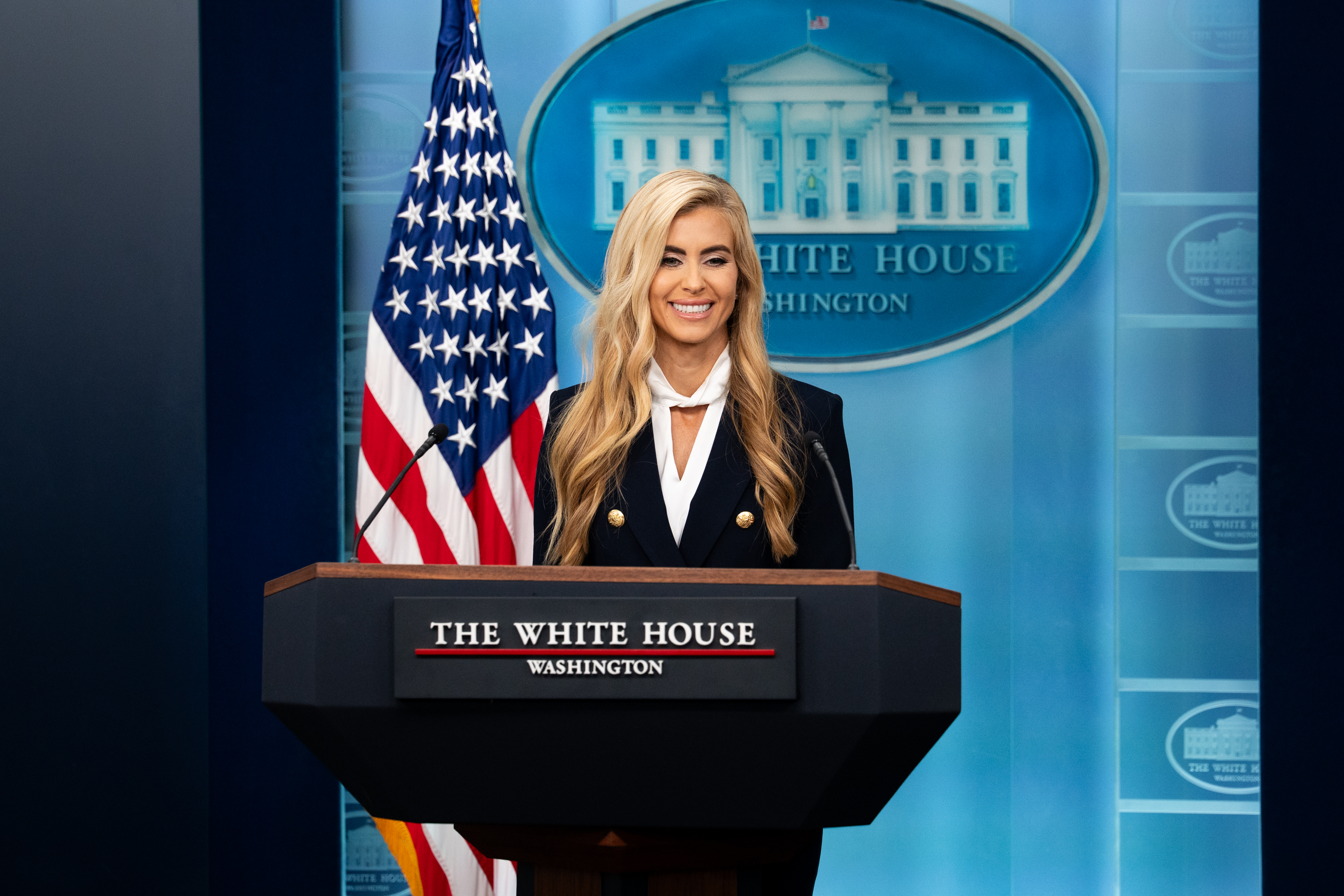 Katie Zacharia at the White House briefing podium on October 13, 2026.