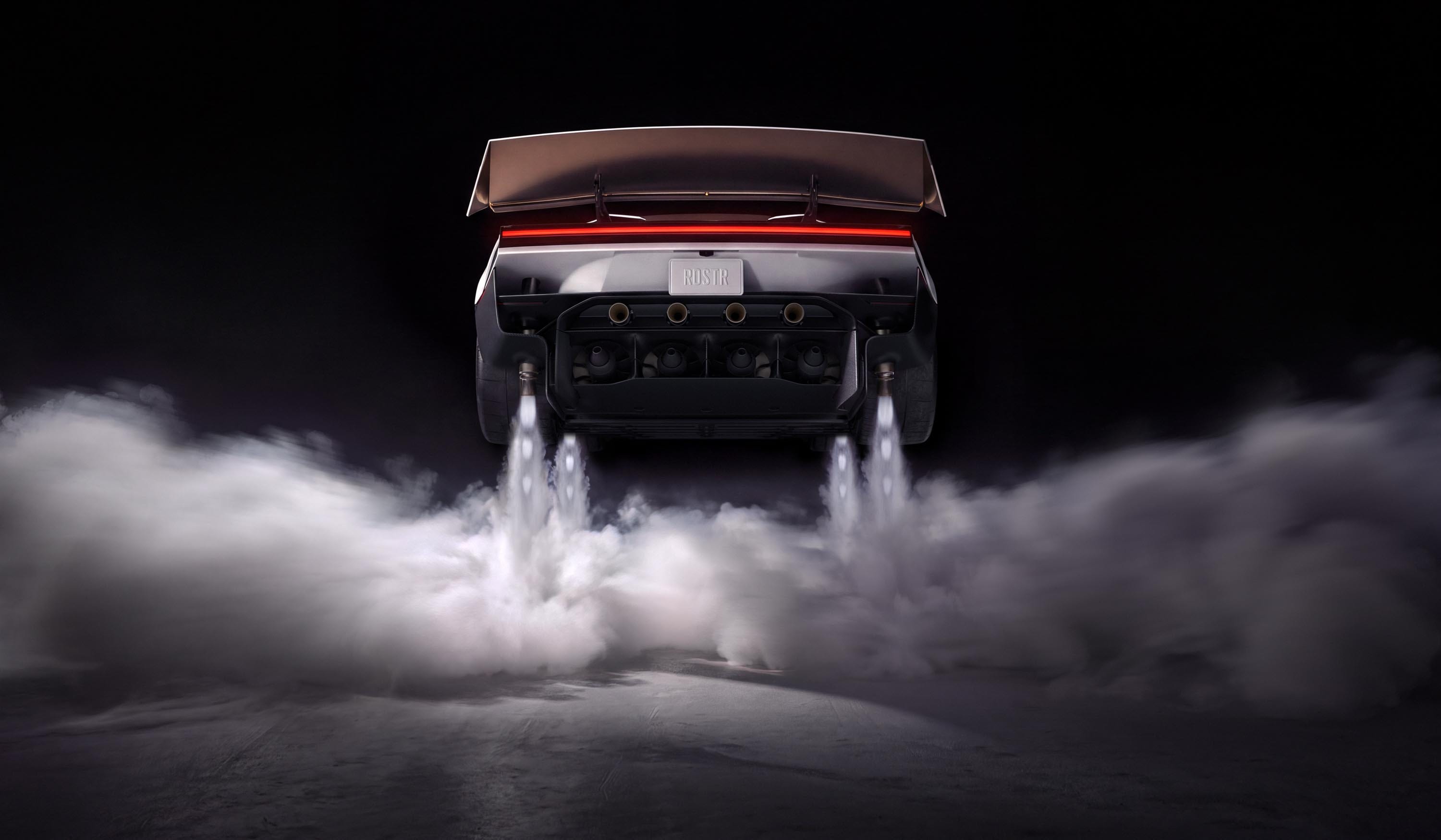 Rear view of Tesla’s new Roadster airborne, with downward-facing thrusters firing.